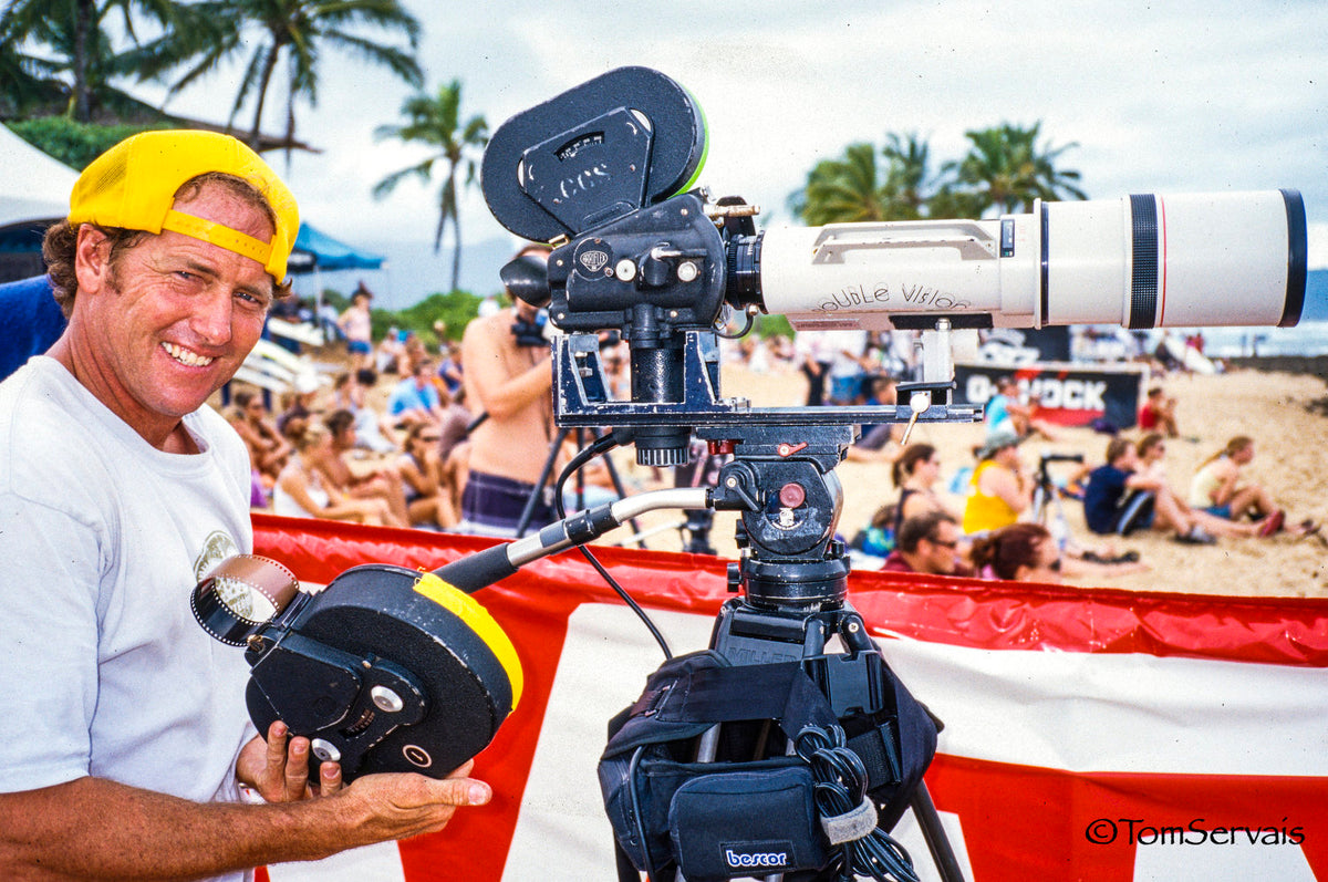 Sonny Miller with his film camera on the beach