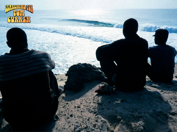 Locals watch the surfing in Mozambique. Photo: Ted Grambeau, 1993.
